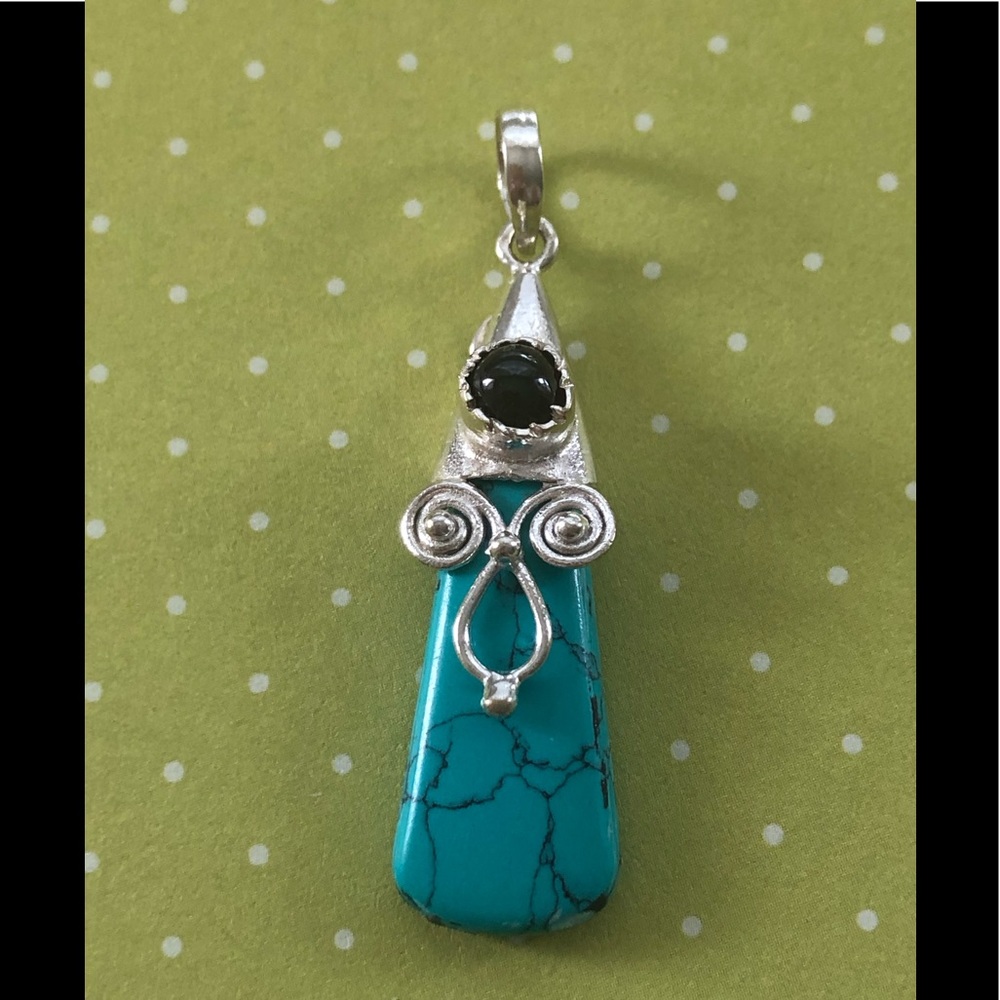 Turquoise and garnet sterling silver pendant